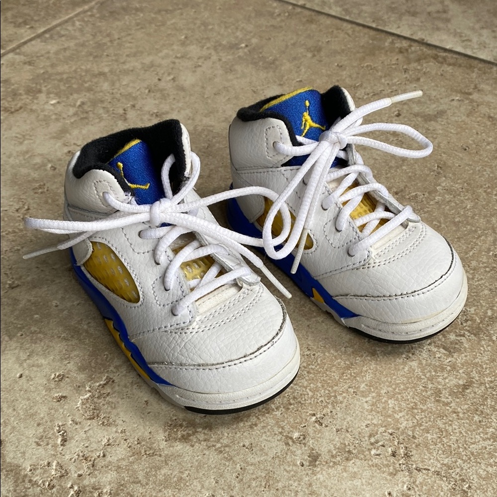 Nike Jordan White and Blue High-Top Sneakers with Padded Collar